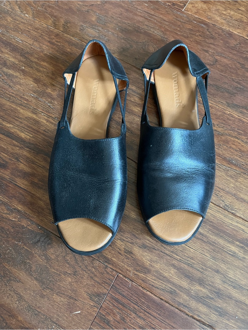 Woman’s Peep Toe Slingback Flats